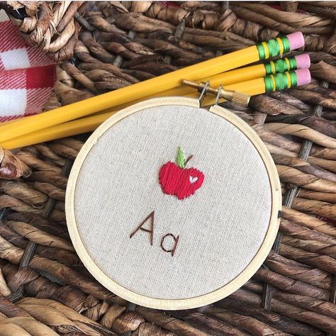 An apple embroidery pattern for your fall decor, back to school set-up, or for your kiddo’s favorite teacher! . . #embroideryartist #sewsweet #farmhousefeelsgood #apple #cozyhome #hyggehome #farmhousedecor #slowstitch #embroideryinstaguild #embroiderypattern#handembroiderypatterns #embroiderylove #handstitched #warmandcozy #handembroidered #dmcembroidery #handembroidery #appleembroidery #folkart #handstitching #thiscreativehome #handstitched #noticepausetreasure Apple Embroidery Patterns, Teacher Embroidery Hoop, Apple Embroidery Designs, Embroidery Apple, Teacher Embroidery, Apple Embroidery, Embroidery Journal, Spirit Bags, School Embroidery