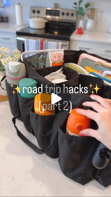 Elaina Zinke on Instagram: "Comment TRIP to get these road trip hacks sent straight to your inbox! 🚗  **Also linked in my Amazon Storefront (in my bio) under “Road Trip” 🚗  #roadtriphacks #roadtripessentials #travelhacks #travelwithkids #roadtripwithkids #amazonfinds #amazontravel #momhacks #travelactivities" Road Trip Basket For Kids, Roadtrip Kids Hacks, How To Pack Snacks For A Road Trip, Road Trip Must Haves For Kids, Car Hacks For Road Trips, Road Trip Snackle Box Ideas, Kids Road Trip Snacks, Traveling Food Ideas Road Trips, Snackle Box Ideas For Kids Road Trip