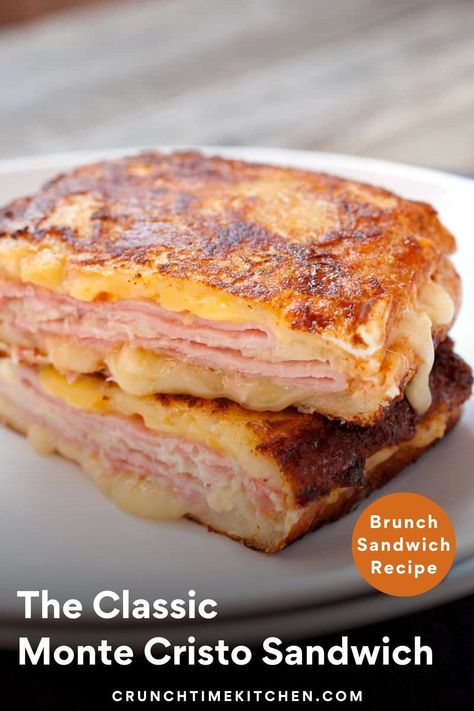 The Classic Monte Cristo Sandwich: There are many ways to make this sandwich, but this is the most tried and true way. Keep it simple with ham, gouda cheese, and the perfect cooking method! | crunchtimekitchen.com #sandwiches #montecristo #classicrecipes #grilledcheese #breakfastsandwiches Savory French Toast, Savoury French Toast, Recipe For Lunch, Monte Cristo Sandwich, Diner Menu, Grilled Sandwiches, Best Sandwich Recipes, Ham Sandwich, Plats Healthy