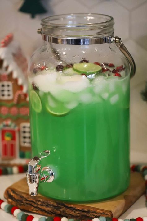 Grinch Punch Grinch Punch With Kool Aid, Grinch Christmas Punch Recipes, Punch Alcoholic Party, Green Rum Punch, Grinch Punch Nonalcoholic, Big Batch Grinch Cocktail, Punch With White Grape Juice, Grinch Punch Recipe For Kids No Sherbert, Grinch Punch With Alcohol