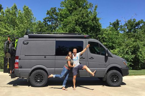 A gun metal grey Sportsmobile 4x4 custom camper van conversion with happy owners standing next to it. Sprinter Van Camper, Mercedes Sprinter 4x4, 4x4 Camper Van, T6 California, Custom Camper Vans, Mercedes Sprinter Camper, T3 Vw, Best 4x4, Sprinter Van Conversion