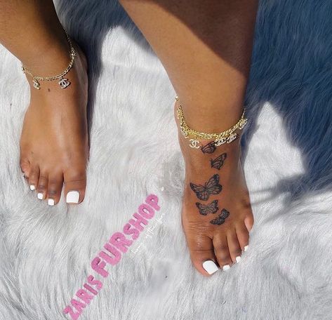 Feet Tattoos Butterfly, Butterfly Ankle Tattoo Black Women, Big Women’s Tattoos, Feet Tats For Women, Feet Butterfly Tattoo, Feet Tattoo Black Women, Feet Tattoos For Women Butterfly, Butterfly On Feet Tattoo, Baddie Elephant Tattoos