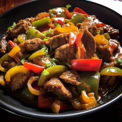 Life doesn't get better than this. This is a family favorite of ours, and we never ever need to worry about leftovers! Yum! Crock Pot Pepper Steak, Slow Cooker Pepper Steak, Pepper Steak And Rice, Beef And Peppers, Crockpot Pepper Steak, Crockpot Stuffed Peppers, Steak And Rice, Slow Cooker Stuffed Peppers, Pepper Steak Recipe