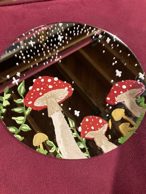 A mirror that has mushrooms on it✨ Mushroom Painting Mirror, Mushroom Painted Mirror, Mirror Painting Mushrooms, Drawing On A Mirror, Mushroom Mirror Painting, Mushroom Record Painting, Mushroom Mirror Diy, Paint On Records, Draw On Mirror