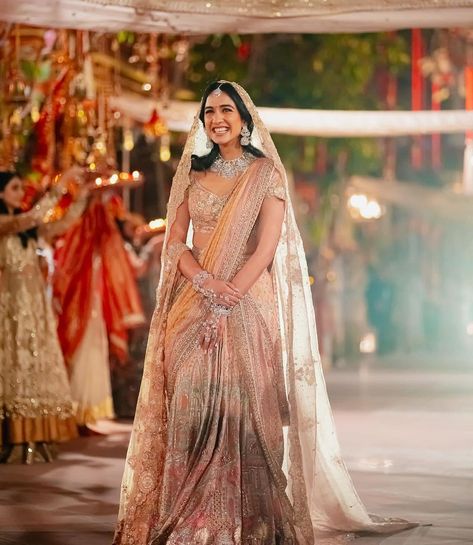 The Anant Ambani and Radhika Merchant wedding has everyone in a tizzy! From elaborate 3-day wedding galas with 5 different themes to hosting it in their home town Jamnagar, everyone wants to know more. But what we are most excited to see is what the beautiful bride-to-be is going to be donning for each of these events and we have it now! Ambani Family, भारतीय दुल्हन संबंधी, Ambani Wedding, Radhika Merchant, Anant Ambani, Gowns Aesthetic, Reception Outfit, Indian Outfits Lehenga, Handmade Fabric Bags