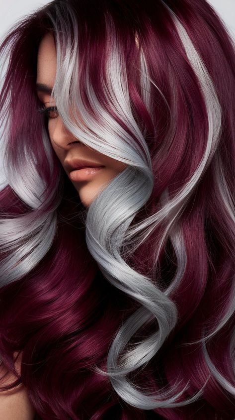 Experience chic elegance with these wavy locks featuring a stunning burgundy and silver color palette. The playful waves and contrasting colors bring a modern twist to classic hairstyles, making it ideal for both everyday wear and special occasions. #hairstyle #haircolor #wavyhair #burgundy #haircut #hairinspo #fallhair Red And Silver Hair Color Ideas, Burgundy Haircut, Maroon Hair With Highlights, Cherry Red And Blonde Hair, Burgundy Lowlights In Blonde Hair, Red And White Hair Color, Blonde With Burgundy Underneath, Burgundy Blonde Balayage, Grey Red Hair