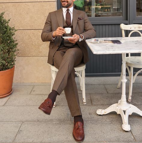 Radiate confidence in our Brown Slim-Fit Suit 3-Piece. The single-breasted 2-button blazer, featuring peak lapels and a fully-lined interior, embodies modern style and timeless sophistication. Perfect for making a lasting impression at any special event. #brownsuit #slimfitsuit #formalwear #suits #mensfashion #specialoccasion #sophisticatedlook #formalattire #dapper Men’s Suits For Fall Wedding, Brown Linen Suit Wedding, Mocha Suit Men, Brown Suits For Men Wedding Classy, Taupe Groom Suit, Men’s Wedding Guest Attire Spring Formal, Brown Wedding Groomsmen, Dark Brown Tuxedo Wedding, Chocolate Brown Suits For Men