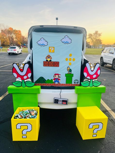 Super Mario Bros Trunk Or Treat Diy, Trunk Or Treat Teacher Ideas, Super Mario Trunk Or Treat Game, Mario World Trunk Or Treat, Trunk Or Treat Video Game Theme, Spooky Mario Trunk Or Treat, Trunk Or Treat 2023 Ideas, Mario Kart Trunk Or Treat Ideas For Cars, Donkey Kong Trunk Or Treat