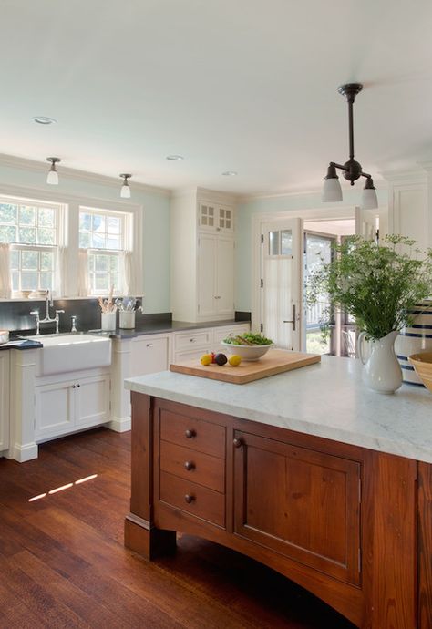 Cottage kitchen with large cherry island topped with a carrara marble illuminated by a bronze two arm pendant light with frosted glass shades. Kitchen Island With Sink, Best Kitchen Cabinets, Farmhouse Kitchen Island, Cherry Cabinets, New Kitchen Cabinets, Kitchen Marble, Black Granite, Kitchen Paint, Trendy Kitchen