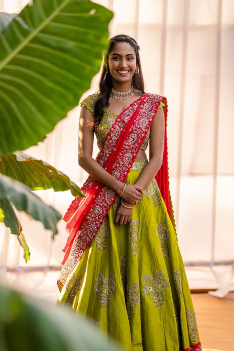 Blissful Telugu Wedding With Decor That Spelled Magic! Telugu Traditional Dress, Red Pattu Half Saree, Langavoni Designs, Half Saree Styling, Half Saree Lehenga Langa Voni, Half Saree For Engagement, Lehanga Styling, Telugu Half Saree, Fancy Half Sarees