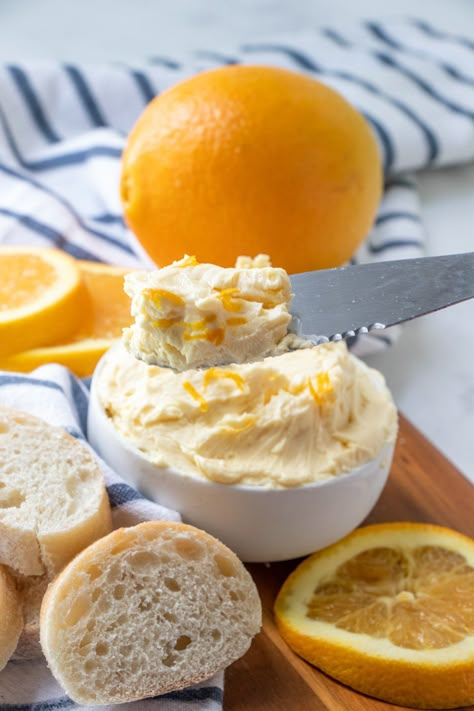 This Orange Butter recipe is a sweet and tangy citrus-infused compound butter made with only two ingredients - butter and orange juice! It's delicious and versatile - spread it over baked goods like muffins and scones, or use it in savory dishes as a glaze or sauce! Orange Compound Butter, Savory Citrus Recipes, Sweet Compound Butter Recipes, Butter Themed Party, Levo Recipes, Butter Spread Recipes, Homemade Butter Recipes, Infused Butter Recipe, Orange Butter Recipe