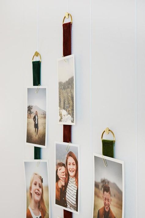 5 Genius DIYs to Display Photos Without Frames | Hunker Diy Wall Photo Display, Photo Display Without Frames, Frameless Picture Wall Ideas, Hanging Art Without Frames, Hang Unframed Art, Unique Frames For Pictures, Photo Wall Without Frames, Photo Wall No Frames, Displaying Photos Without Frames