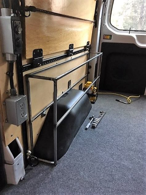 Cargo Van Organization, Overhead Van Storage, Cargo Van Storage Ideas, Camper Wheel Well Ideas, Van Bed Storage, Van Clothing Storage, Van Storage Ideas Tools, Diy Van Storage Ideas, Work Van Storage Ideas