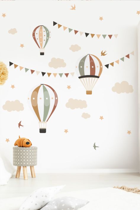 Transform your child's room into a whimsical wonderland with our Wall Decal Balloons in Ocher, Green and brown. Featuring a playful design of hot air balloons, clouds, and stars, this decal is the perfect addition to any kids' room, playroom, or nursery. Made from high-quality vinyl, our decal is easy to apply and remove without damaging your walls. Plus, with its peel and stick feature, you can have a new look in just minutes! Kids Study Room Ideas, Room Boho Decor, Toddler And Baby Room, Playroom Mural, Baby Room Decals, Boho Kids Room, Hot Air Balloon Nursery, Clouds And Stars, Kids Room Murals