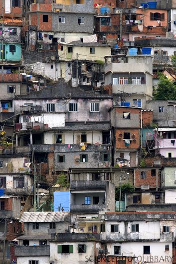 Close up of Brazilian hillside Favelas, which are a common sight throughout Brazil's major cities, are home to millions of urban poor and rural migrants who leave the countryside seeking jobs. Many of the slums are plagued by violence linked to drug trafficking. Favelas Brazil, The Slums, Shanty Town, Science Photos, Urban Area, Photo Library, Urban Landscape, Metropolis, Rio De Janeiro