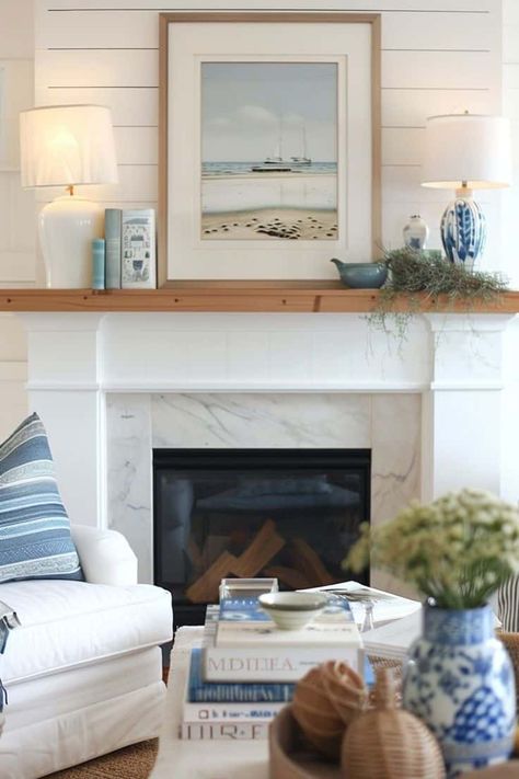 12 Coastal Fireplace Mantel Styling Ideas » Lady Decluttered Hamptons Fireplace, Coastal Fireplace Ideas, Beach House Fireplace, Neutral Coastal Living Room, Charleston Apartment, Coastal Fireplace, Mantel Styling, Farmhouse Mantle Decor, Fireplace Windows