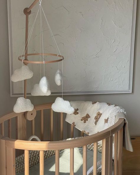 Perfectly styled for a beautiful, neutral nursery ☁️🐻 Order your timeless boucle cloud mobile today via the product link, a staple piece that will grow with your family 🤍 📷 @stixandstems_ * * * #edieandjoe #handmade #babygirlnurseryinspo #smallbusinessowner #scandinursery #bouclemobile #minimalnursery #nurseryideas #neutralnursery #letthembelittle #babykeepsake #genderneutralnursery #cloudthemenursery #handmadebabygift #babygifts #nurserydecor #nurseryinspo #handmadecushions #bouclecloud... Beige Nursery Aesthetic, White And Neutral Nursery, Cloud Nursery Theme Gender Neutral, Baby Girl Nursery Aesthetic, Baby Room Neutral Colors, Cloud Baby Nursery, Baby Boy Nursery Theme Ideas, Diy Baby Nursery Ideas, Boy Baby Room Ideas