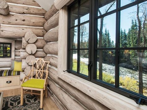 White Log Cabin Exterior, Bedroom With Sloped Ceiling, Log Cabin Walls, Black And Cream Rug, Living Room Window Seat, Log Cabin Bedrooms, Log Cabin Remodel, Log Cabin Bedroom, Cabin Walls