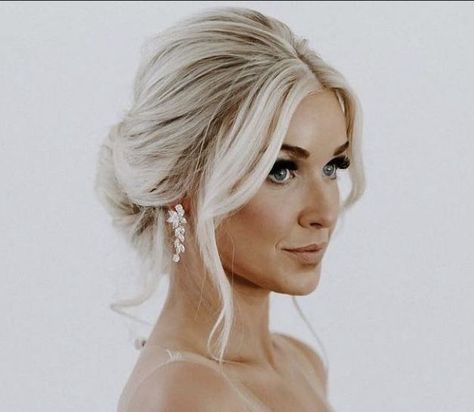 Low Updo Wedding Hair Blonde, Wedding Hair Messy Low Bun, Middle Part Low Bun Wedding, Veil In Updo, Wedding Simple Updo Brides, Bride Blonde Hairstyles, Low Messy Bun Wedding Hair With Veil, Timeless Wedding Hair Up Dos, Loose Updo Bridesmaid