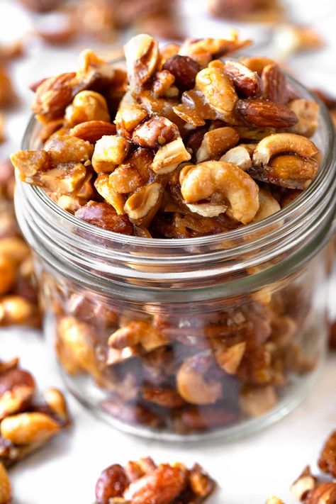 These buttered toffee candied nuts are the perfect sweet, crunchy snack during holidays, or anytime you crave a buttery and nutty treat! | thecozyapron.com #candiednutsrecipe #candiednuts #candiednutsrecipeeasy #candiednutsrecipechristmas #butteredtoffeenuts #butteredtoffeecandiednuts Butter Toffee Nuts Recipe, Candied Nuts Recipe Christmas, Candied Nuts Recipe, Candied Pecans Recipe, Toffee Candy, Toffee Nut, Christmas 2025, Holiday Chocolate, Butter Toffee