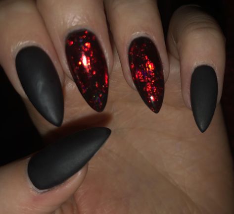 In the 3 years Ive been getting dip Ive never dabbled in black or anything too dark (I stick to pinks usually) until today. I love these spooky season nails even though they are cliche!! #nails #nailsart Black With Red Sparkle Nails, Black Nails Red Sparkle, Gothic Dip Powder Nails, Sparkly Red And Black Nails, Paint Under Nails, Black Halloween Dip Nails, Black And Garnet Nails, Dip Nail Ideas Halloween, Black Nails Red Rhinestones