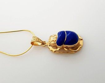 Royal Family Names, Beetle Jewelry, Scarab Necklace, Egyptian Beetle, Scarab Pendant, Ancient Egyptians, Necklace Blue, Amulets, Polish Jewelry