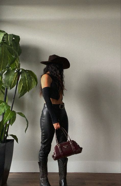 Cowboy Boots Outfit Baddie, Cowboy Boots Leather Pants, Black And Gold Cowgirl Outfit, Cowboy Boots Pants Outfit, Leather Pants Cowboy Boots Outfit, Cowgirl Outfit Ideas For Women, Leather Cowboy Outfit, Cowboy Bar Outfit, Cowgirl Black Outfit