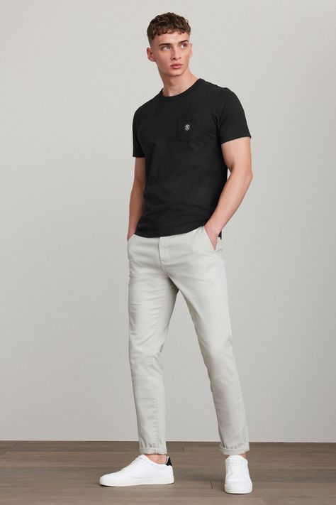 A wardrobe staple, our versatile chino trousers are made from a cotton stretch fabric for comfort and style all in one. Designed in a classic chino silhouette, they look great dressed up or down. With two functional back pockets, our variety of fits, colours, and leg lengths ensure you can find your perfect match. Also available with a modern update, our elasticated waist styles offer an adjustable fit that's right for you, and our pleat chinos offer a choice in an everyday classic. Next - Your Chinos Men Outfit, Shirt Outfit Men, Design Jersey, Corporate Fashion, Outfits Hombre, Blue Chinos, Stretch Cotton Fabric, Stripe Outfits, Wardrobe Classic