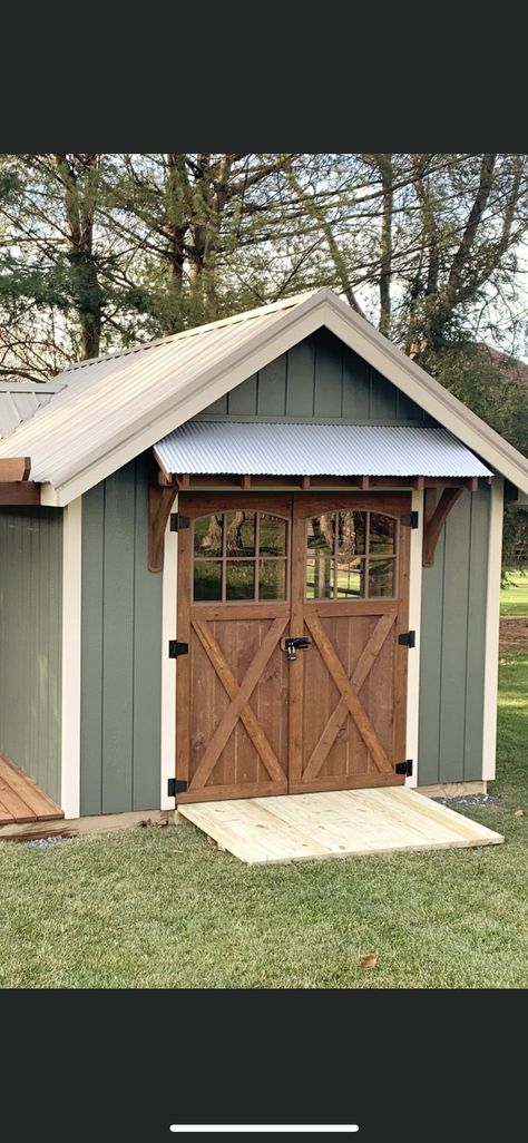 Small Shed Exterior Ideas, Metal Roof Shed Ideas, Wood Shed Color Ideas, Diy Shed Paint Ideas, Storage Shed Makeover Exterior, Small Shed With Overhang, Small Shed Paint Ideas, Sheds Ideas Backyard Landscaping, 8x10 Shed Ideas