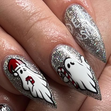 Heather Buzzell on Instagram: "👻Dead inside, but it’s Xmas👻 . Products used: •Maria •Whiteout •Blackout •Bad Romance •Luxa Shine No-Wipe Top Coat  Use discount code: handittoheather to save MONEY when you shop with @luxapolish  . . #nails #nail #nailart #nailartist #nailtech #nailpolish #gelpolish #gel #nailpro #gelnails #luxapolish #halloween #halloweennails #luxaaf #christmas #christmasnails #ghost #spirit #holiday #season #november #december #october #inspo #stiletto #glitter #glitternails #love" Spooky Holiday Nails, Dracula Nail Art, Spooky Xmas Nails, Christmas Ghost Nails, Christmas Nail Art 2024, Anti Christmas Nails, Winter Witch Nails, A Christmas Story Nails, Simple Nightmare Before Christmas Nails