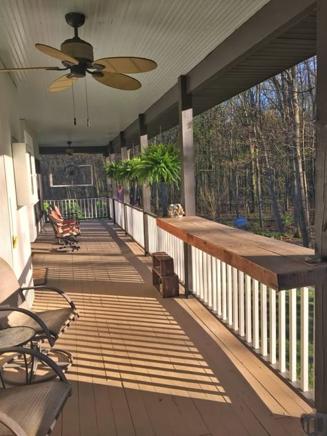 Wrap Around Porch With Screened Porch, Porch Railing Shelf, Back Porch Building Ideas, Front Porch Ideas Cabin, L Shaped Front Porch Decorating Ideas, Front Porch Bar, Dark Farmhouse Exterior Wrap Around Porch, Industrial Porch Ideas, Wrap Around Porch Seating Ideas