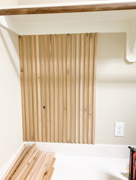 Mid Century Modern Statement Wall, Laundry Room With Faux Brick Wall, Laundry Room Statement Wall, Trendy Laundry Room, Wood Slat Wall Laundry Room, Midcentury Laundry Room Ideas, Small Statement Wall, Boho Paint Designs On Wall, Laundry Accent Wall