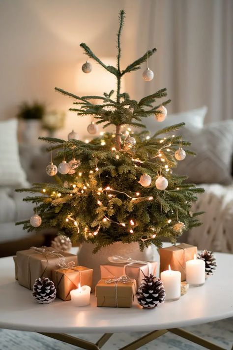 15 Inspiring Coffee Table Christmas Decor Ideas - Lil Dutch Uncle Mini Christmas Tree On Table, Small Real Christmas Tree, Small Christmas Tree On Table, Decorate Mini Christmas Tree, Table Christmas Tree Ideas, Small Tree Christmas Decor, Christmas Decorations Without A Tree, Christmas Decor Without A Tree, Small Christmas Tree Decor Ideas