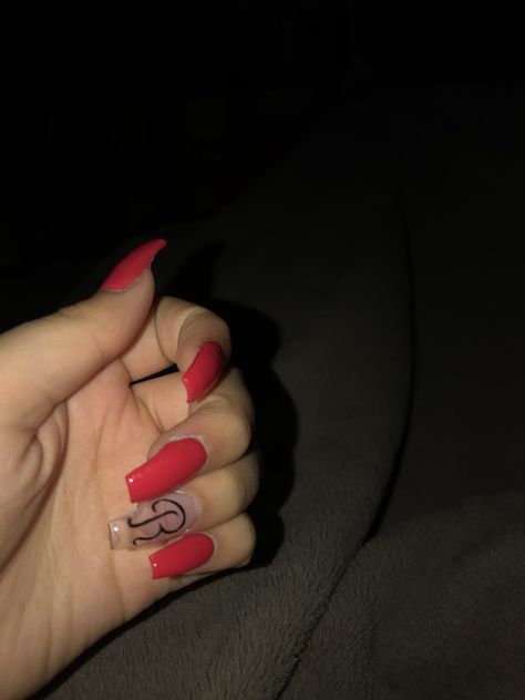 Red with letter r nails Red Nails With Letter Design, Red Acrylic Nails With Letter Design, Nails With The Letter S On Them, Red Acrylic Nails Coffin With Initials, R Initial On Nails, Acrylic Nails With R Initial, Red Nail Designs With Initial, Letter R Nails Designs, Nails R Initial