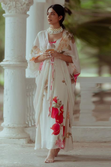 Buy Ivory Habutai Printed Floral Sweetheart Maxi Dress For Women by Paulmi and Harsh Online at Aza Fashions. Indian Printed Dresses, Desi Clothes Aesthetic, Paulmi And Harsh, Ali Fazal, Floral Cape, Silky Maxi Dress, Reception Bride, White Floral Maxi Dress, Dress With Jacket