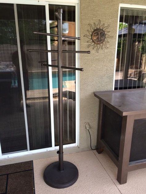 Our new swanky poolside towel tree rack thing Pool Towel Rack Diy, Poolside Towel Rack, Pvc Towel Rack, Poolside Ideas, Outdoor Towel Rack, Pool Organization, Pool Towel Holders, Walk Ideas, Towel Rack Pool