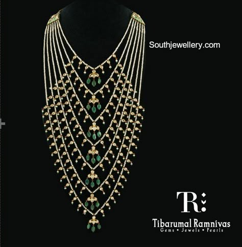 Satlada haar adorned with pearls, polkis and emeralds by Tibarumal Ramnivas Jewellers. Fine Diamond Jewellery Satlada Necklace Gold, Bridal Haaram, Satlada Necklace, Jewellery South Indian, Emerald Jewellery, Clean Gold Jewelry, Pearl Necklace Designs, Fine Gold Jewelry, Jewellery Bridal