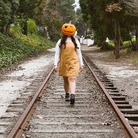 Walking down railroad tracks wearing a pumpkinhead. #railroad #photoshootideas #halloween #pumpkin Railroad Track Pictures, Track Pictures, Fall Pictures, Halloween Pumpkin, Instagram Pictures, Railroad Tracks, Photoshoot Ideas, Walking, Track