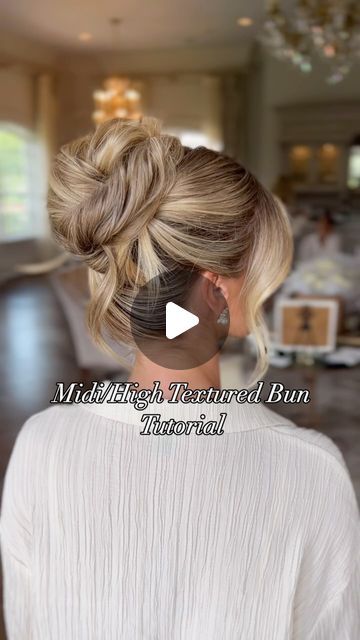 Kristen Okaly on Instagram: "Midi/High Textured Bun 🤍
.
Mua @glam.sesh 
.
#weddingreels #njbridalhair #njbridalhairstylist #bridereels #hairtutorial #bridalhairideas #bridalhairstyles #njbridetobe #updoeducation #updoeducator #haireducation #bridesmaidhair #parkchateauwedding #weddinginspiration #bohobrides #bridalupdoideas #bridalupdostyle" Soft High Bun Wedding Updo, High Updo Wedding Bridesmaid, Wedding Bun High, Mid High Bridal Bun, High Bun Bridal Hair, Bridal High Updo, Bridal High Updo Tutorial, High Bun Wedding Hairstyles, High Bun Wedding