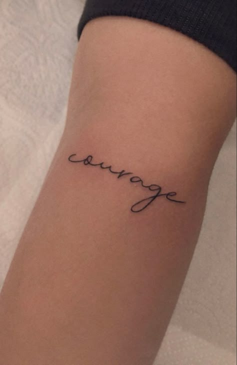 Courage Wrist Tattoo, Tattoos That Resemble Strength, Minimal Tattoo Words, Tattoo Inspirasjon Women Text, Courage Tattoo For Women, Tattoo Courage, Back Tattoos Men, Simple Text Tattoo, Courage Tattoo