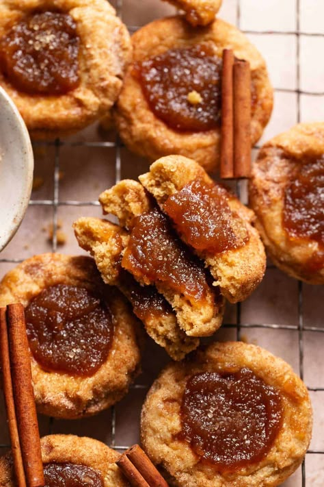 Apple butter snickerdoodles— a deliciously cozy twist on classic snickerdoodles. Soft, chewy, coated in cinnamon sugar, and filled with spiced apple butter, they are perfect for fall! Fancy Snickerdoodle Cookies, Spiced Apple Dessert, Cookies Recipes Thanksgiving, Thanksgiving Dessert Aesthetic, Apple Spice Desserts, Thanksgiving Baking Aesthetic, Fall Pastries Desserts, Pretty Holiday Desserts, Apple Butter Baked Goods