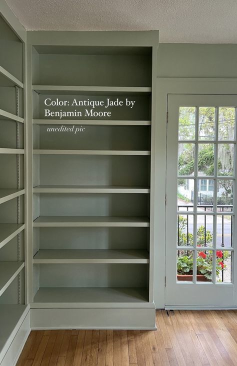 Sage Green Shelves, Light Green Interior Doors, Sage Green Bookshelves, Sage Green Library, Sage Green Built Ins, Pistachio Paint Color, Green Painted Bookshelves, Sage Green Study, Sage Study