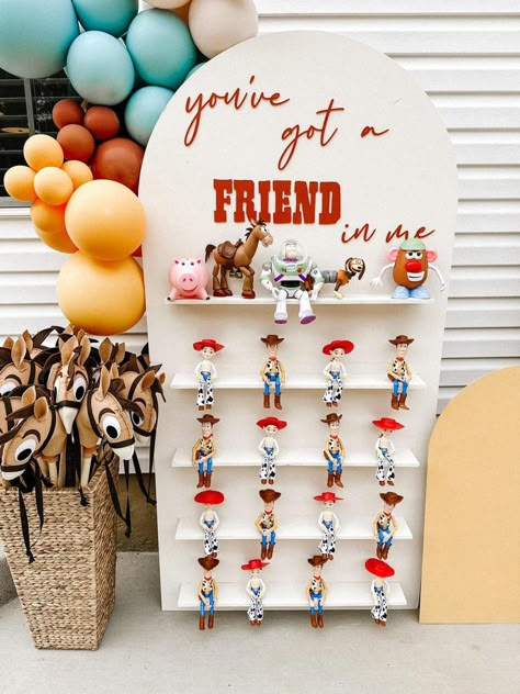 Toy Story Flower Arrangements, Toy Story Bounce House, Toy Story Cowboy Party, You Got A Friend Whos Three, Toys Story Baby Shower Ideas, Toy Story Rodeo Party, Woody 2nd Birthday Party, Toy Story Park Party, You’ve Got A Friend In Three Birthday