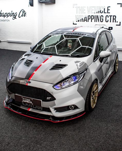 Camo Wrap Car, Black And Red Car Wrap, Metallic Green Car Wrap, Vehicle Wrap Design, Camo Wraps, Ford Fiesta St, Grey Car, Camouflage Design, Vehicle Wrap