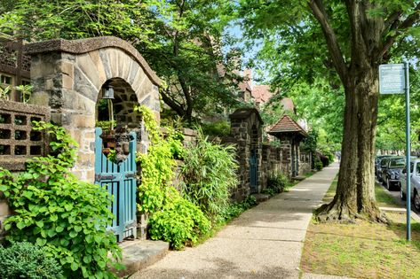 Coveted townhouse in Queens' enchanted Forest Hills Gardens lists for $2.5M | 6sqft Forest Hills Queens, Forest Hills Gardens, Frederick Law Olmsted, Long Island Railroad, Garden On A Hill, Forest City, English Village, Queens Ny, Front Patio