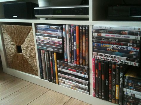 Efficient DVD storage solution for EXPEDIT closet (ikea) Hidden Dvd Storage, Dvd Storage Ideas Living Room, Dvd Storage Ideas Diy, Theater Storage, Diy Dvd Storage Ideas, Organizing Dvds, Ikea Dvd Storage, Dvd Storage Solutions, Ikea Storage Furniture