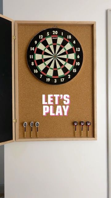 Diy Cork Dart Board, How To Make A Dart Board, How To Hang A Dart Board, Home Darts Set Up, Modern Dart Board Wall, Hidden Dart Board Ideas, Dart Board Wall Diy, Darts Setup, Retail Jokes