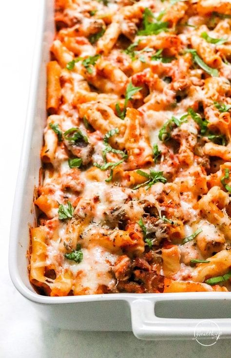 Baked ziti with ricotta and meat sauce is classic comfort food, and it will become one of your family's favorite meals! Baked Ziti Half Baked Harvest, Ziti With Ground Beef, Baked Ziti With Ground Beef, Baked Spaghetti Pie, Christmas Casseroles, Baked Ziti With Ricotta, Recipe Spinach, Ziti Recipe, Spaghetti Pie