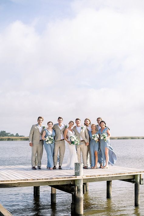 Tan Suits Beach Wedding, Blue Bridesmaid Tan Groomsmen, Dusty Blue Bridesmaid Dresses And Tan Suits, Tan Tux With Dusty Blue, Sky Blue Bridesmaids And Groomsmen, Beige Groomsmen Suits Blue Bridesmaid Dresses, Wedding Ceremony Bridal Party, Shades Of Blue Groomsmen Suits, Wedding Tan Suits Groomsmen