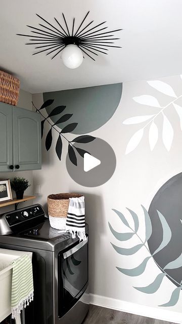 𝗩𝗮𝗹𝗲𝗿𝗶𝗲 | 𝗛𝗼𝗺𝗲 & 𝗖𝗼𝘁𝘁𝗮𝗴𝗲 on Instagram: "Have you ever considered stepping out of your comfort zone and painting a simple mural on the wall? If it doesn’t work out you just paint over it and start again! Laundry is a lot more fun when you have a hand painted mural to look at! Here’s to trying new things in 2024 🌿  • • • • •  #wallmural #handpaintedmural #mural #wallmurals #diywallart #diywalldecor #diypaint #laundryroommakeover #laundryroom #mycolourfulhome #colorfulhome #maker #creativelifehappylife #over50blogger #over60blogger #retired #retiredlife #simplelifehappylife #diyart #artdiy #colourmakesmehappy #bohowallart #bohowalldecor" Laundry Room Wall Design Ideas, Simple Mural, Hand Painted Mural, Room Wall Design, Laundry Room Colors, Painted Mural, Laundry Room Wall, Wall Design Ideas, Room Wall Painting